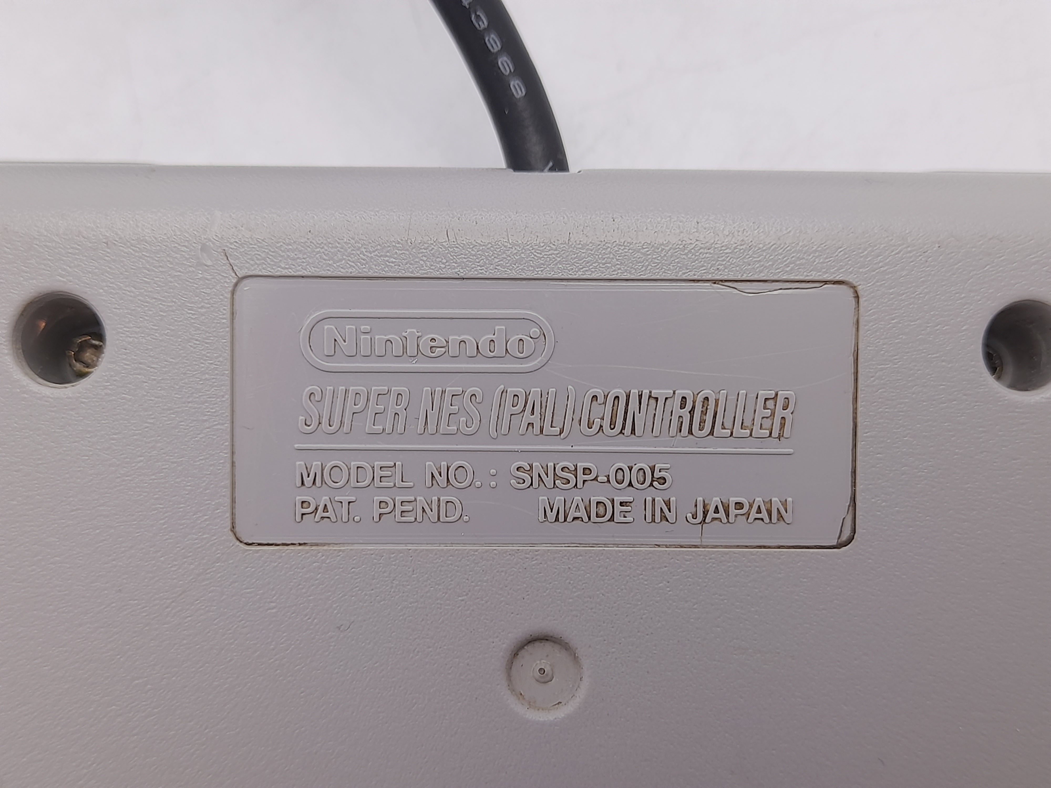Foto van Super Nintendo Controller in Doos